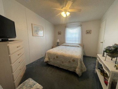 NEW REDUCED PRICE ~ $89,900! Located adjacent to a Florida on Four Lakes Golf Club in Florida - for sale on GolfHomes.com, golf home, golf lot