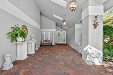 Tropical Oasis awaits! Welcome to your beautiful updated 4 on Boca Grove Golf and Tennis in Florida - for sale on GolfHomes.com, golf home, golf lot