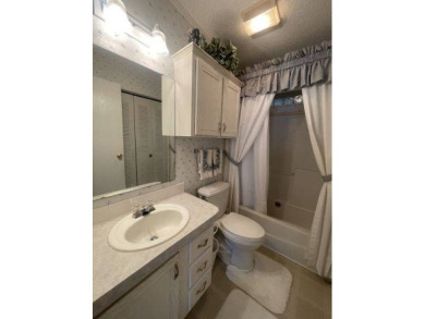 NEW REDUCED PRICE ~ $89,900! Located adjacent to a Florida on Four Lakes Golf Club in Florida - for sale on GolfHomes.com, golf home, golf lot