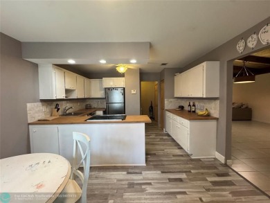 Amazing villa with 2 master suites. Walk in closets in both on Jacaranda Golf Club in Florida - for sale on GolfHomes.com, golf home, golf lot