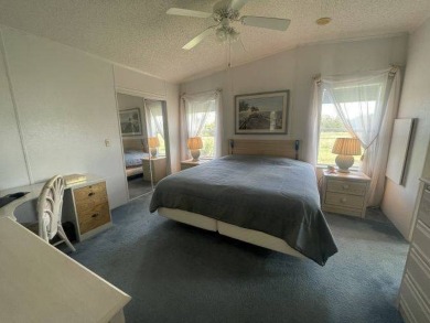 NEW REDUCED PRICE ~ $89,900! Located adjacent to a Florida on Four Lakes Golf Club in Florida - for sale on GolfHomes.com, golf home, golf lot