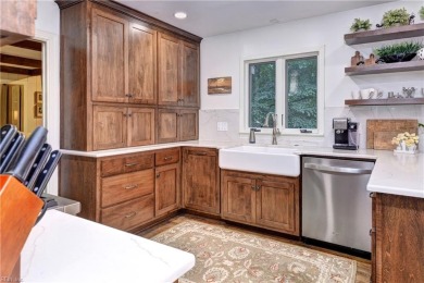 Tucked on a quiet, tree-lined street in Kingsmill, this on Kingsmill Resort and Golf Club in Virginia - for sale on GolfHomes.com, golf home, golf lot