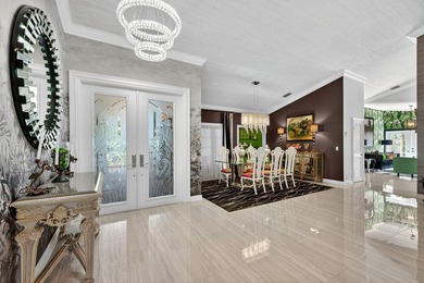 Tropical Oasis awaits! Welcome to your beautiful updated 4 on Boca Grove Golf and Tennis in Florida - for sale on GolfHomes.com, golf home, golf lot