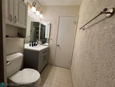 Amazing villa with 2 master suites. Walk in closets in both on Jacaranda Golf Club in Florida - for sale on GolfHomes.com, golf home, golf lot
