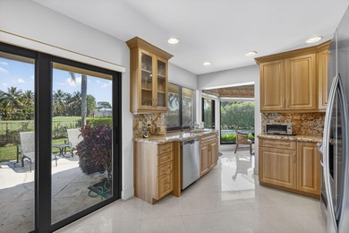 This lovely 3 bedroom, 3.5 bath home with den/office plus air on Hamlet Country Club in Florida - for sale on GolfHomes.com, golf home, golf lot