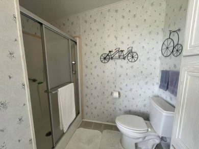 NEW REDUCED PRICE ~ $89,900! Located adjacent to a Florida on Four Lakes Golf Club in Florida - for sale on GolfHomes.com, golf home, golf lot