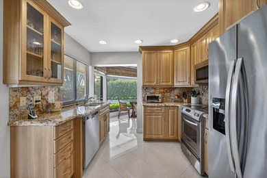 This lovely 3 bedroom, 3.5 bath home with den/office plus air on Hamlet Country Club in Florida - for sale on GolfHomes.com, golf home, golf lot