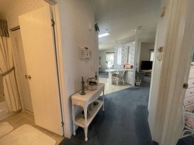 NEW REDUCED PRICE ~ $89,900! Located adjacent to a Florida on Four Lakes Golf Club in Florida - for sale on GolfHomes.com, golf home, golf lot