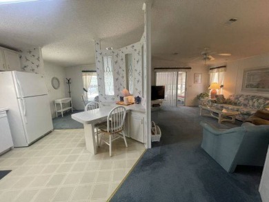 NEW REDUCED PRICE ~ $89,900! Located adjacent to a Florida on Four Lakes Golf Club in Florida - for sale on GolfHomes.com, golf home, golf lot
