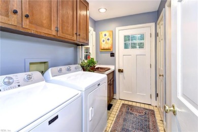 Tucked on a quiet, tree-lined street in Kingsmill, this on Kingsmill Resort and Golf Club in Virginia - for sale on GolfHomes.com, golf home, golf lot