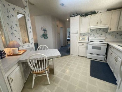 NEW REDUCED PRICE ~ $89,900! Located adjacent to a Florida on Four Lakes Golf Club in Florida - for sale on GolfHomes.com, golf home, golf lot