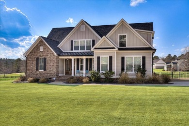 This stunning modern home that sits on over half an acre awaits on Mount Vintage Plantation and Golf Club  in South Carolina - for sale on GolfHomes.com, golf home, golf lot