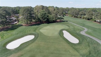 Tucked on a quiet, tree-lined street in Kingsmill, this on Kingsmill Resort and Golf Club in Virginia - for sale on GolfHomes.com, golf home, golf lot