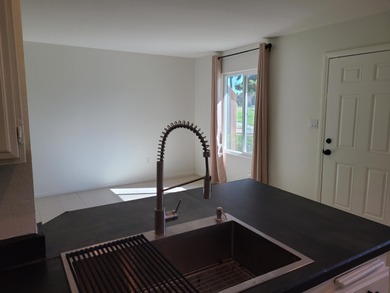 Welcome to this inviting two-bedroom, one-bath end unit condo on Indian Palms Country Club and Resort in California - for sale on GolfHomes.com, golf home, golf lot