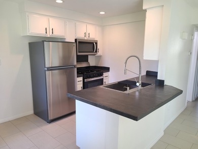 Welcome to this inviting two-bedroom, one-bath end unit condo on Indian Palms Country Club and Resort in California - for sale on GolfHomes.com, golf home, golf lot