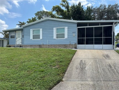 Move-in ready home in a desirable 55+ golf community overlooking on Zellwood Station Country Club in Florida - for sale on GolfHomes.com, golf home, golf lot