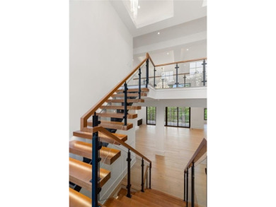 Step into a world of elegance and luxury where this stunning on Echelon Golf Club in Georgia - for sale on GolfHomes.com, golf home, golf lot