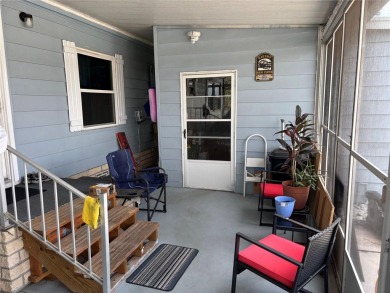 Move-in ready home in a desirable 55+ golf community overlooking on Zellwood Station Country Club in Florida - for sale on GolfHomes.com, golf home, golf lot