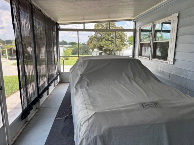 Move-in ready home in a desirable 55+ golf community overlooking on Zellwood Station Country Club in Florida - for sale on GolfHomes.com, golf home, golf lot