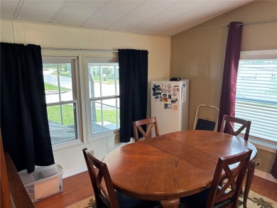 Move-in ready home in a desirable 55+ golf community overlooking on Zellwood Station Country Club in Florida - for sale on GolfHomes.com, golf home, golf lot