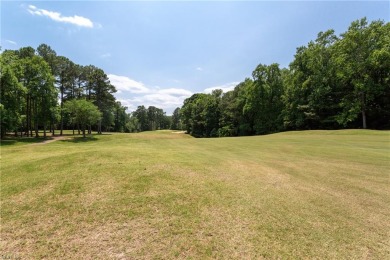 Situated on a beautiful cul-de-sac lot on the 11th green of the on Kingsmill Resort and Golf Club in Virginia - for sale on GolfHomes.com, golf home, golf lot