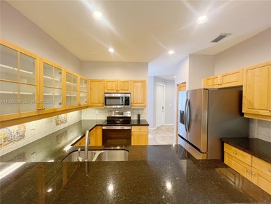 Beautifully maintained 3-bedroom, 2.5-bath two-story townhouse on Grand Palms Hotel and Golf Resort in Florida - for sale on GolfHomes.com, golf home, golf lot