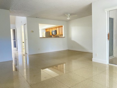 Deer Creek 2/2.5 townhouse all tiled on 1st level, with laundry on Deer Creek Golf Club in Florida - for sale on GolfHomes.com, golf home, golf lot