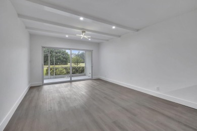 This property is sponsored by Listingcredit and qualifies for a on Palm-Aire Country Club and Resort - Palms in Florida - for sale on GolfHomes.com, golf home, golf lot