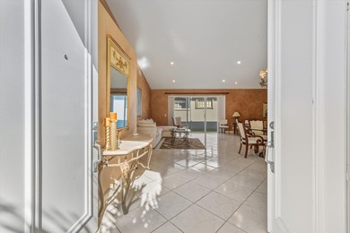 Welcome to this beautifully maintained 3-bedroom, 2.5-bath home on Wycliffe Golf and Country Club in Florida - for sale on GolfHomes.com, golf home, golf lot