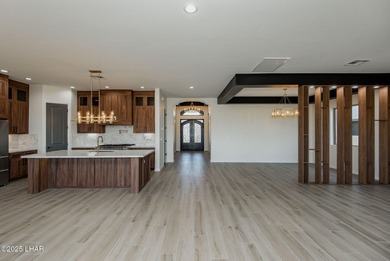 Stunning New Construction on the Los Lagos Golf Course! This on Los Lagos Golf Club in Arizona - for sale on GolfHomes.com, golf home, golf lot