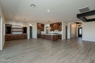 Stunning New Construction on the Los Lagos Golf Course! This on Los Lagos Golf Club in Arizona - for sale on GolfHomes.com, golf home, golf lot