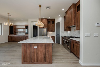 Stunning New Construction on the Los Lagos Golf Course! This on Los Lagos Golf Club in Arizona - for sale on GolfHomes.com, golf home, golf lot