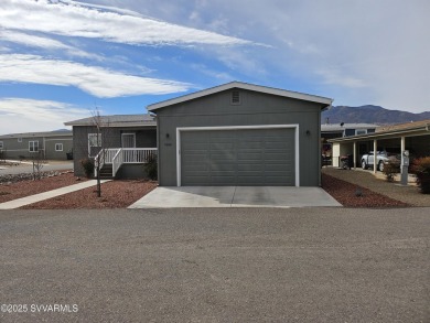 Pristine corner lot Home in 55+ Gated Golf Community!  This on Pine Shadows Golf Course in Arizona - for sale on GolfHomes.com, golf home, golf lot