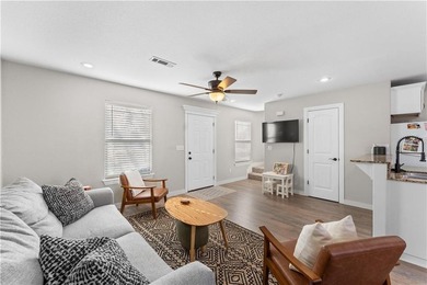 Welcome to this update 1,480 square foot home in the wooded on Bella Vista - Metfield Golf Complex and Country Club in Arkansas - for sale on GolfHomes.com, golf home, golf lot