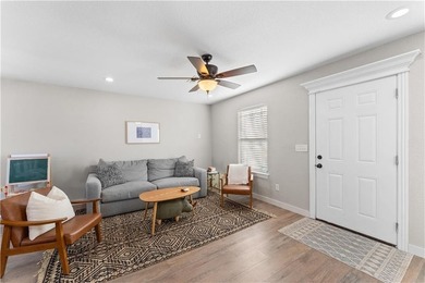 Welcome to this update 1,480 square foot home in the wooded on Bella Vista - Metfield Golf Complex and Country Club in Arkansas - for sale on GolfHomes.com, golf home, golf lot