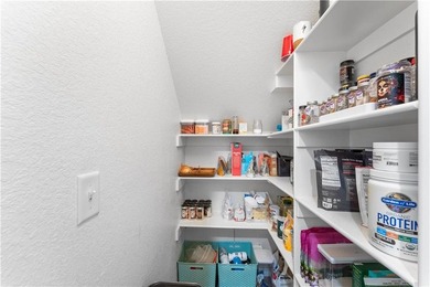 Welcome to this update 1,480 square foot home in the wooded on Bella Vista - Metfield Golf Complex and Country Club in Arkansas - for sale on GolfHomes.com, golf home, golf lot