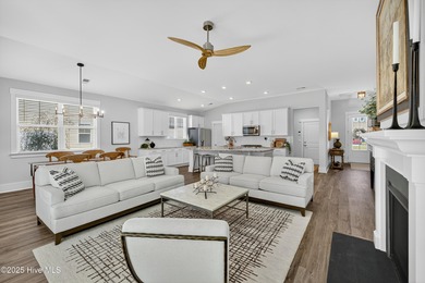 Welcome to 7952 Harrier Circle in the sought-after Heron Pointe on Cape Fear National At Brunswick Forest in North Carolina - for sale on GolfHomes.com, golf home, golf lot