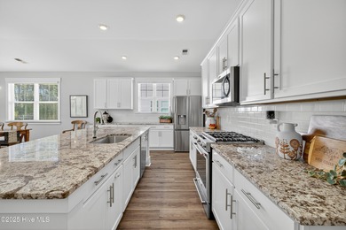 Welcome to 7952 Harrier Circle in the sought-after Heron Pointe on Cape Fear National At Brunswick Forest in North Carolina - for sale on GolfHomes.com, golf home, golf lot