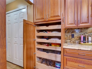 This meticulously-kept custom home offers an oversized custom on Plantation Golf Club in Florida - for sale on GolfHomes.com, golf home, golf lot