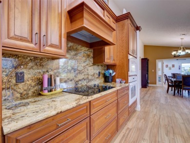 This meticulously-kept custom home offers an oversized custom on Plantation Golf Club in Florida - for sale on GolfHomes.com, golf home, golf lot