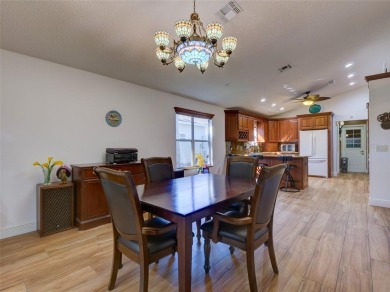 This meticulously-kept custom home offers an oversized custom on Plantation Golf Club in Florida - for sale on GolfHomes.com, golf home, golf lot