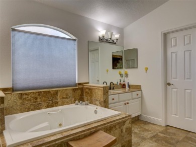 This meticulously-kept custom home offers an oversized custom on Plantation Golf Club in Florida - for sale on GolfHomes.com, golf home, golf lot