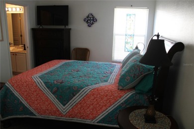 This meticulously-kept custom home offers an oversized custom on Plantation Golf Club in Florida - for sale on GolfHomes.com, golf home, golf lot