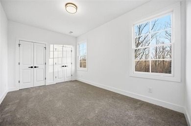 Welcome to 71 Quartz Way, a refined residence located within the on Achasta Golf Club in Georgia - for sale on GolfHomes.com, golf home, golf lot