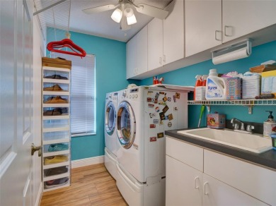 This meticulously-kept custom home offers an oversized custom on Plantation Golf Club in Florida - for sale on GolfHomes.com, golf home, golf lot