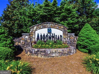 This beautiful wooded lot in the prestigious Lake Arrowhead on The Highlands Course at Lake Arrowhead in Georgia - for sale on GolfHomes.com, golf home, golf lot