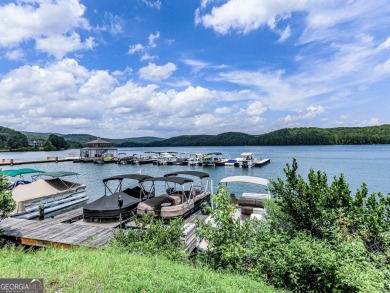 This beautiful wooded lot in the prestigious Lake Arrowhead on The Highlands Course at Lake Arrowhead in Georgia - for sale on GolfHomes.com, golf home, golf lot