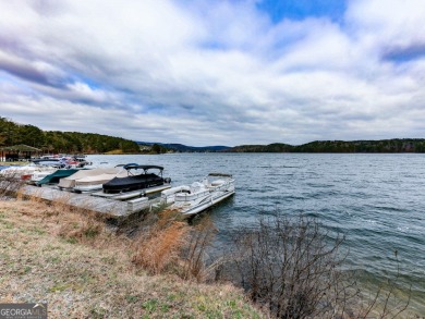 This beautiful wooded lot in the prestigious Lake Arrowhead on The Highlands Course at Lake Arrowhead in Georgia - for sale on GolfHomes.com, golf home, golf lot