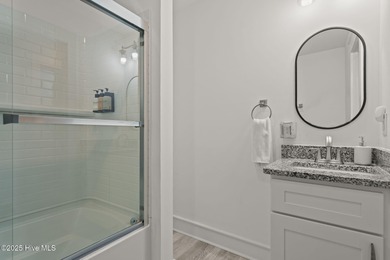 This fully furnished pristine open floor plan beach home offers on Founders Club At St. James Plantation in North Carolina - for sale on GolfHomes.com, golf home, golf lot