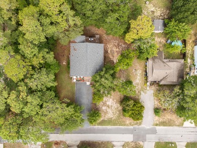 This fully furnished pristine open floor plan beach home offers on Founders Club At St. James Plantation in North Carolina - for sale on GolfHomes.com, golf home, golf lot